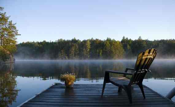 Chair on the dock at a cottage